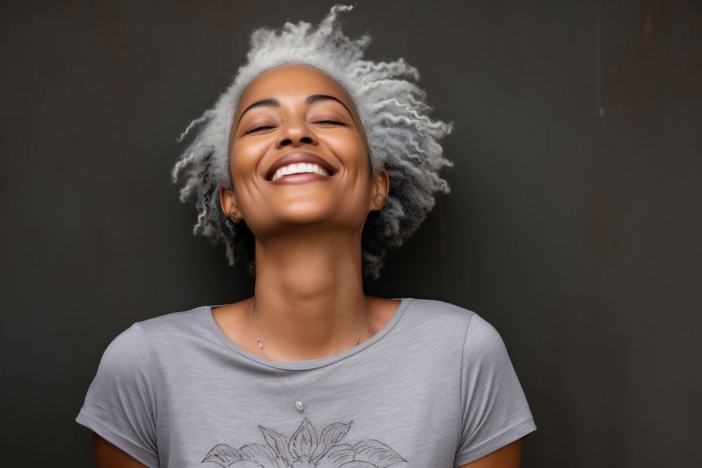 African american woman laughing portrait smile. AI generated Image by rawpixel.