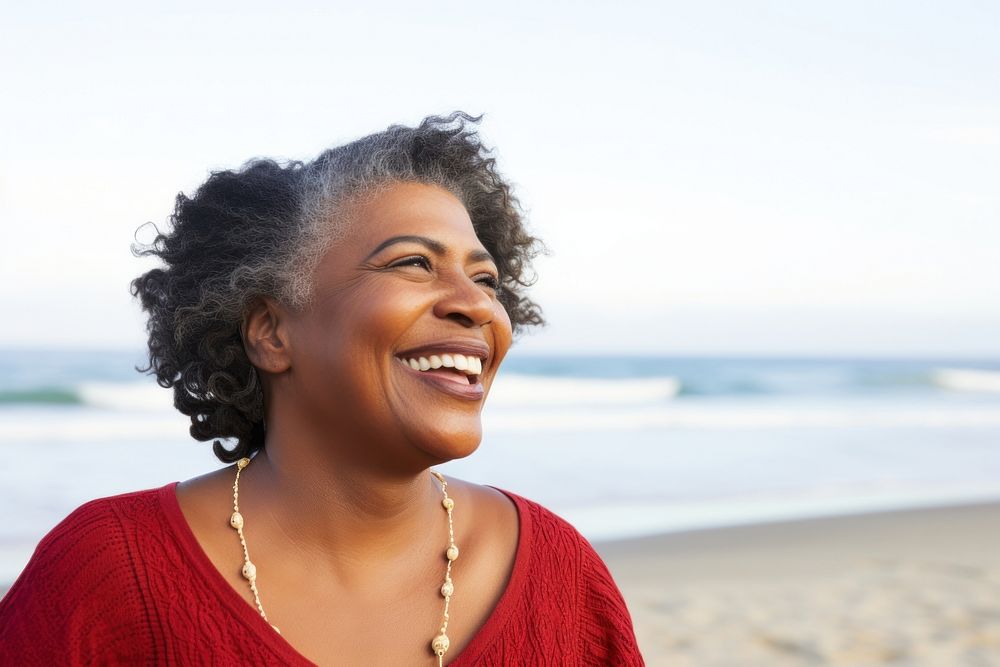 Mature african american woman portrait laughing beach. AI generated Image by rawpixel.