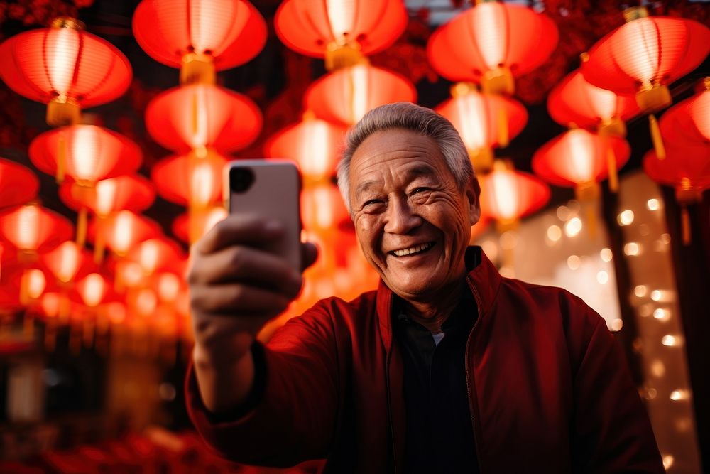 Chinese senior man selfie lantern adult. AI generated Image by rawpixel.