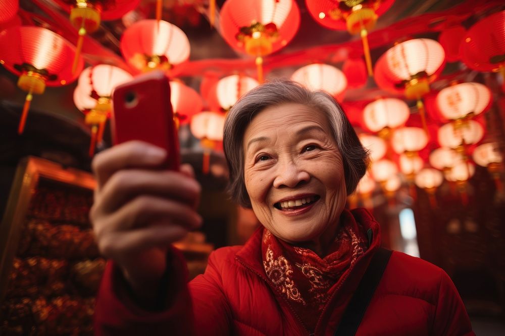 Chinese senior woman lantern selfie adult. AI generated Image by rawpixel.