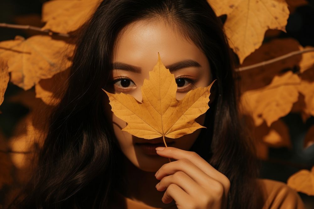Asian american woman leaf portrait holding. AI generated Image by rawpixel.