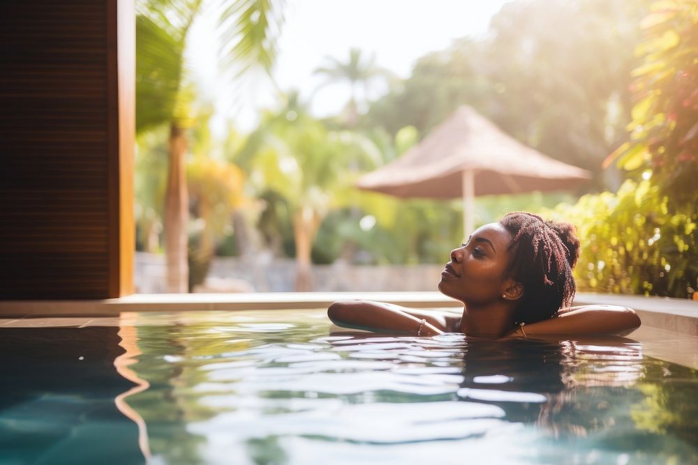 African american woman swimming holiday travel. AI generated Image by rawpixel.