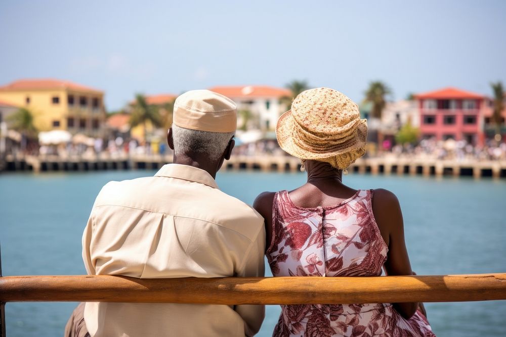Mature african american couple waterfront holiday travel. AI generated Image by rawpixel.
