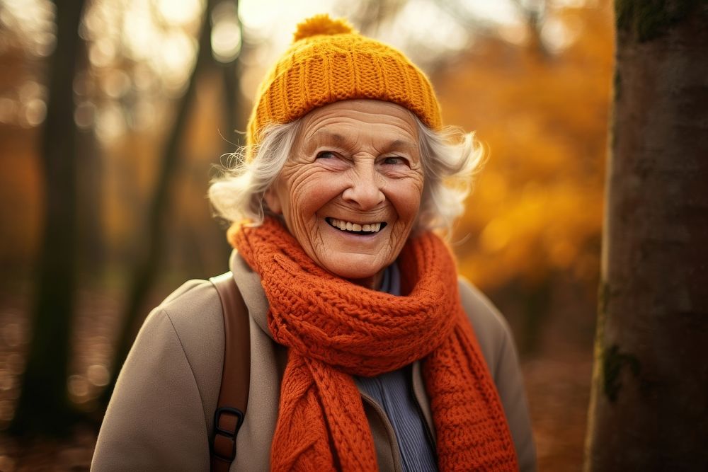 Senior happy woman portrait autumn scarf. 