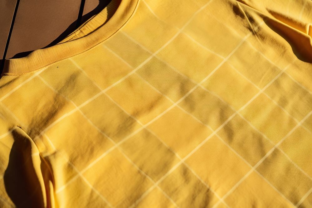 Yellow graphic tee t-shirt text clothing. AI generated Image by rawpixel.