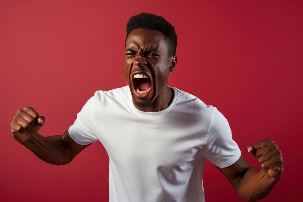 Angry young man shouting t-shirt adult. AI generated Image by rawpixel.