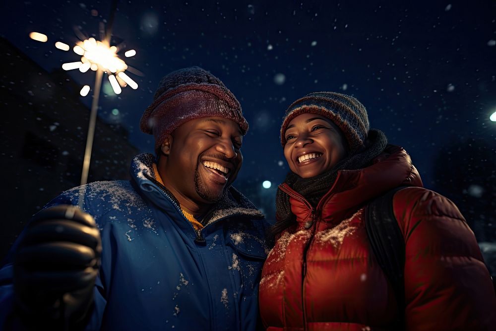Couple holding glow sticks outdoors portrait winter. AI generated Image by rawpixel.