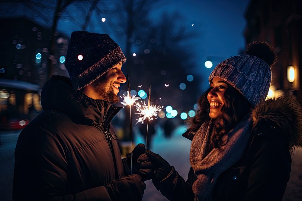 Couple holding glow sticks outdoors winter light. AI generated Image by rawpixel.