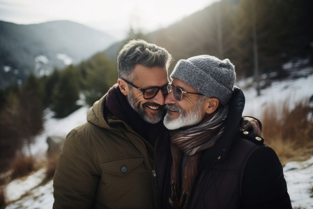 Mature gay couple embracing tree photography mountain. AI generated Image by rawpixel.