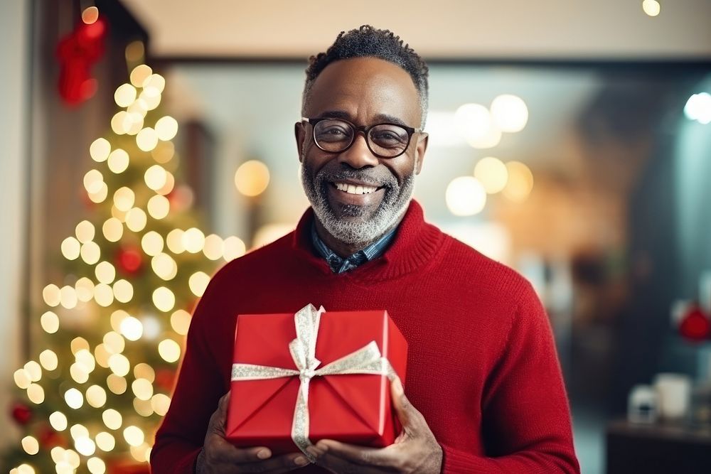 Christmas gift glasses smiling holding. AI generated Image by rawpixel.