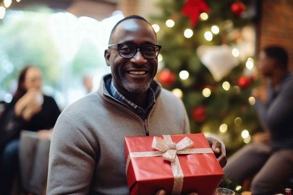 Christmas present glasses smiling holding. AI generated Image by rawpixel.