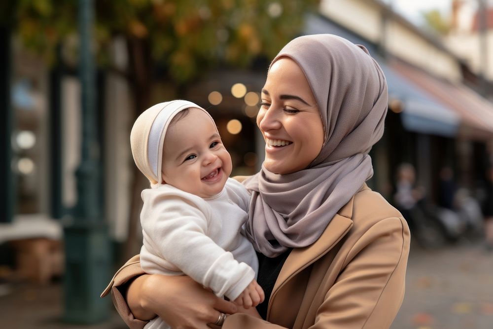 Baby smiling scarf togetherness. 