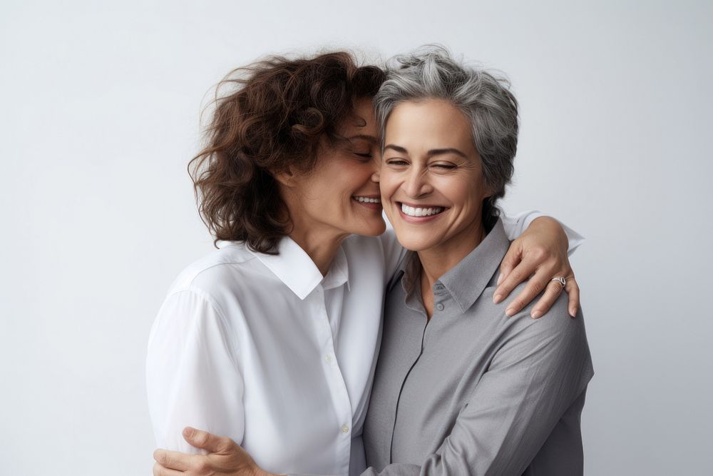 Two mature women hugging laughing romance adult. AI generated Image by rawpixel.