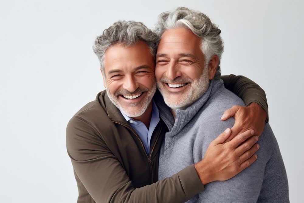 Two mature men hugging laughing romance smile. AI generated Image by rawpixel.