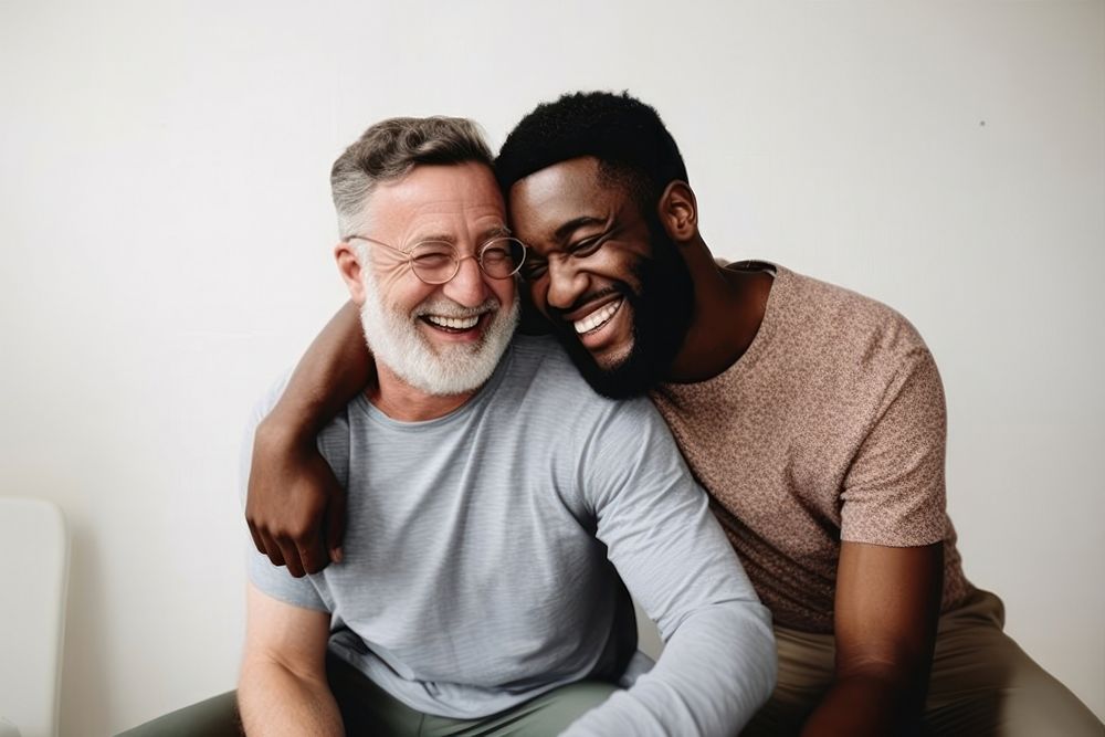 Two men hugging laughing smile adult. AI generated Image by rawpixel.