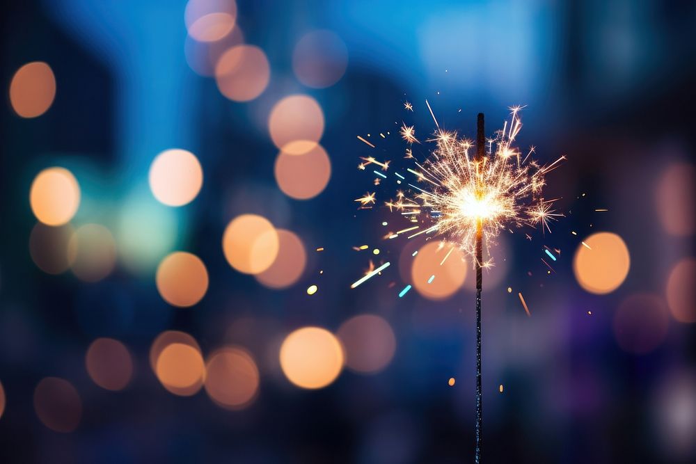 New years sparkler fireworks lighting outdoors. AI generated Image by rawpixel.