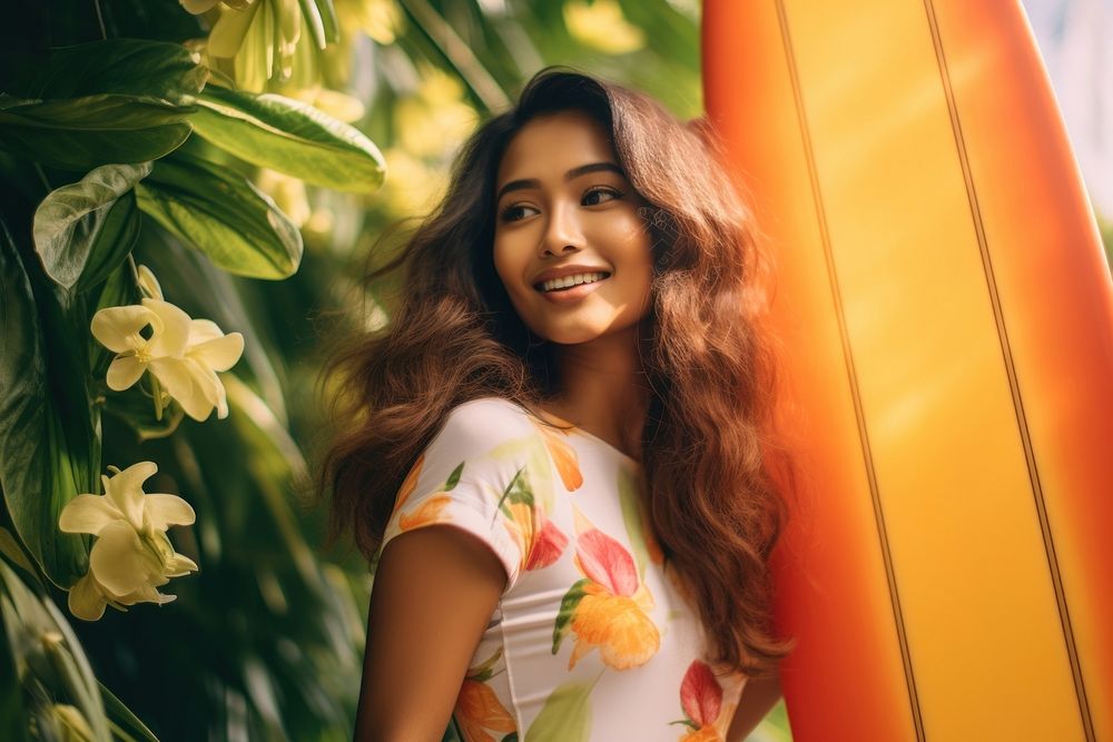 A young Indonesian woman holding a surfboard summer smile adult. AI generated Image by rawpixel.