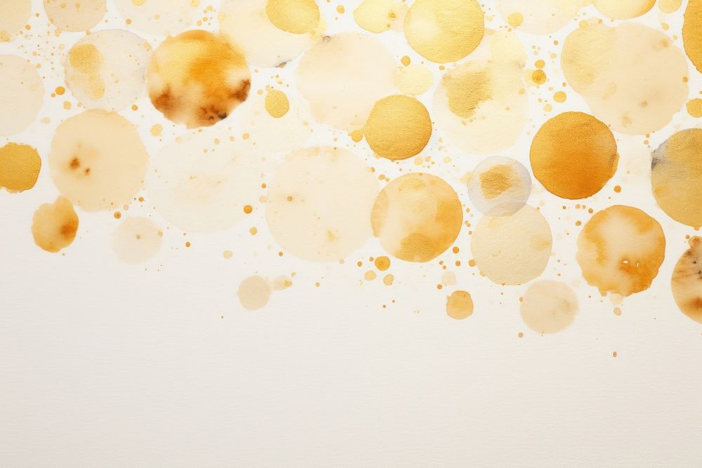 A watercolor drops backgrounds paper gold. AI generated Image by rawpixel.