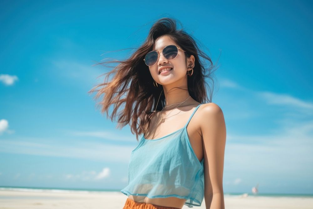 A Vietnamese teen sunglasses portrait vacation. AI generated Image by rawpixel.