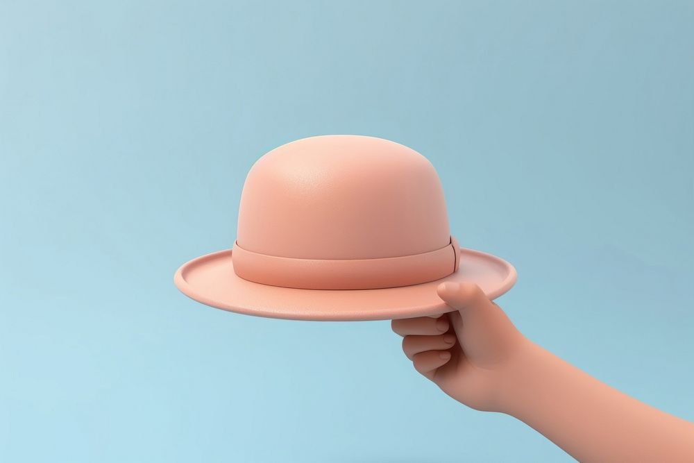 Hand holding a hat headwear clothing fondant. AI generated Image by rawpixel.