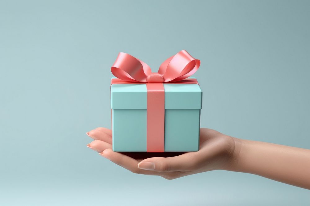 Hand holding a gift box celebration anniversary cosmetics. AI generated Image by rawpixel.