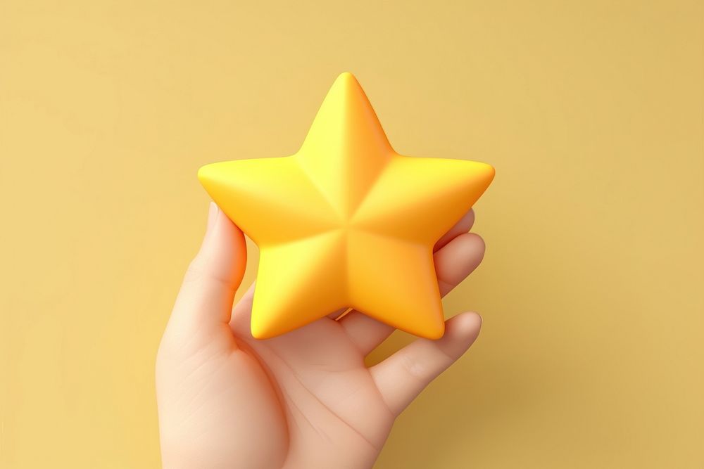 Hand holding solid yellow star shape simplicity christmas. AI generated Image by rawpixel.