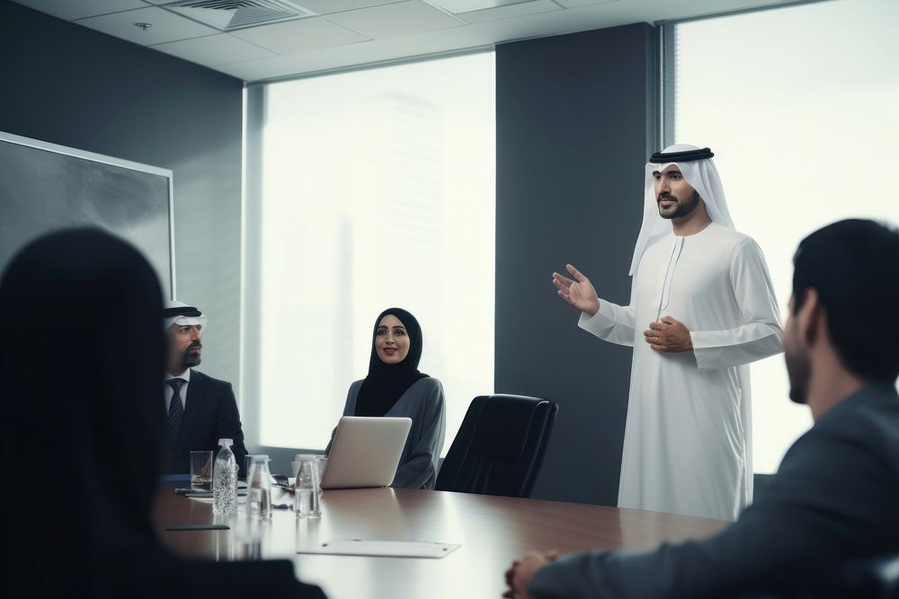 Arabic business people presenting meeting office adult. AI generated Image by rawpixel.