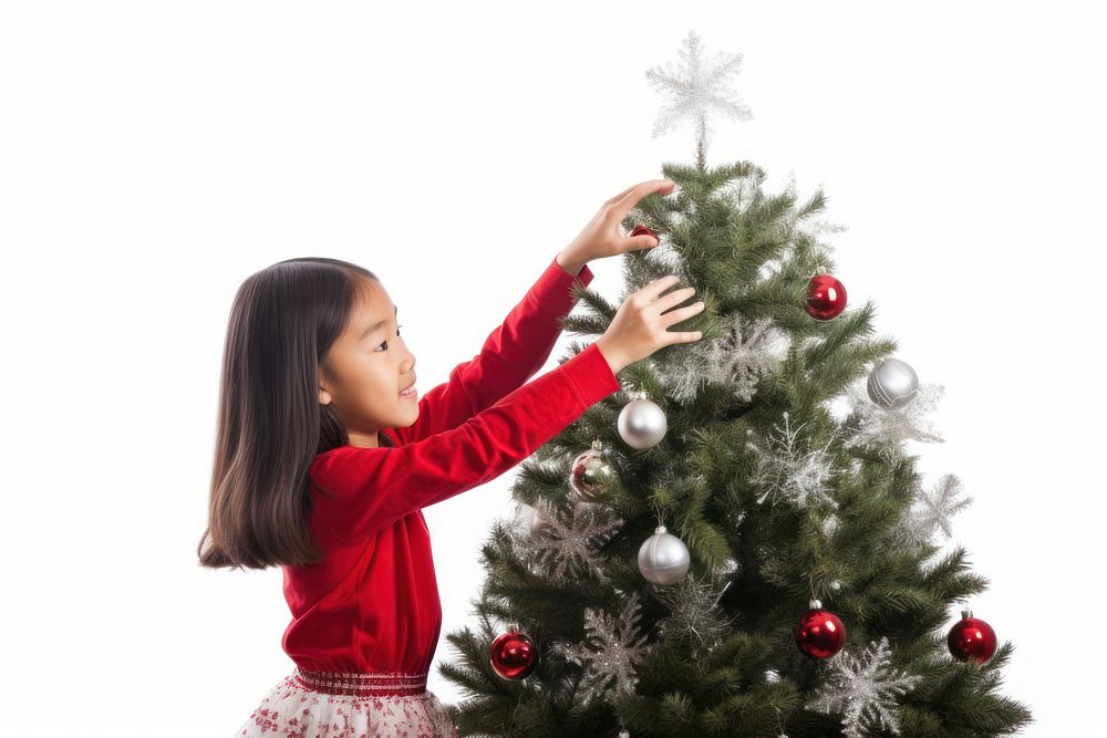 Christmas tree plant child girl. AI generated Image by rawpixel.