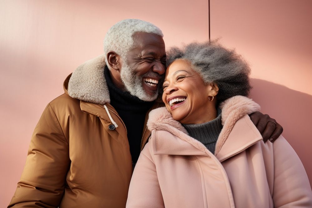 Happy black senior couple wearing a winter jacket laughing adult coat. AI generated Image by rawpixel.