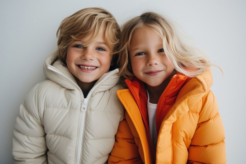 Happy kids wearing a winter jacket portrait child smile. AI generated Image by rawpixel.
