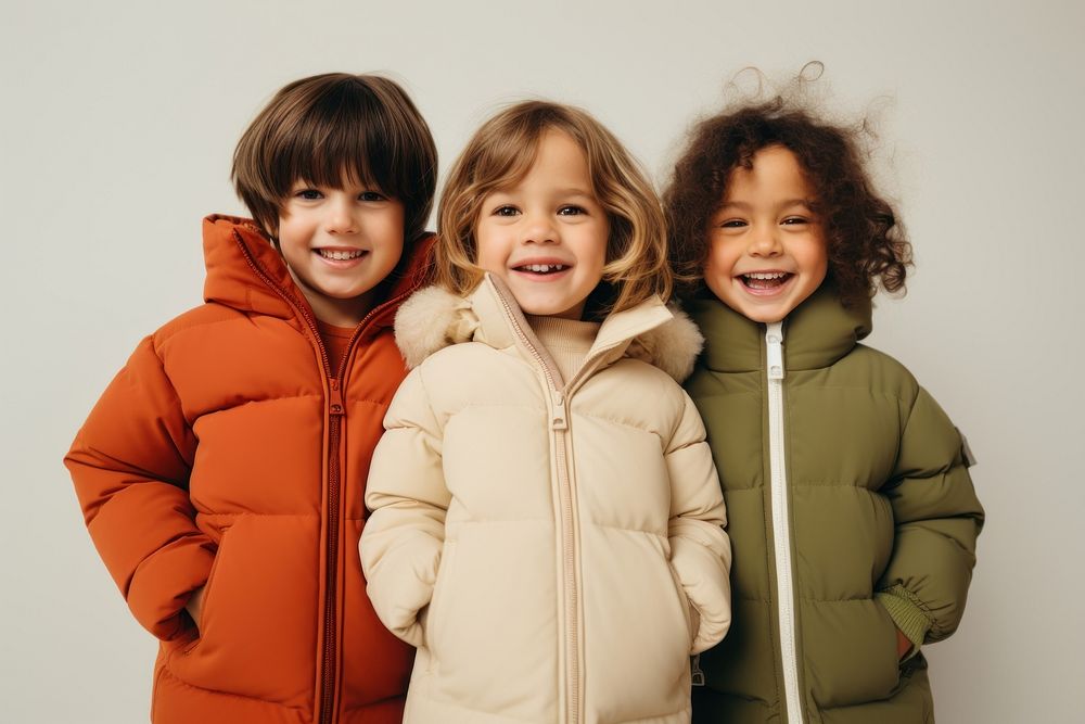 Happy kids wearing a winter jacket sweatshirt portrait photo. AI generated Image by rawpixel.