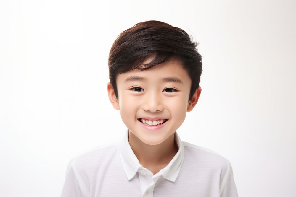 Asian boy smiling smile white background happiness. AI generated Image by rawpixel.