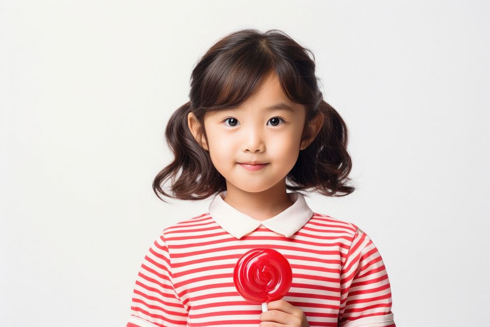 Girl holds lolipop portrait lollipop child. AI generated Image by rawpixel.