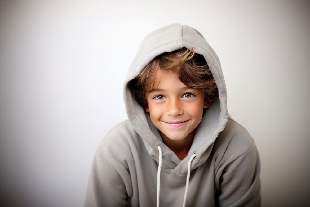 Young boy smiling hood sweatshirt portrait. AI generated Image by rawpixel.