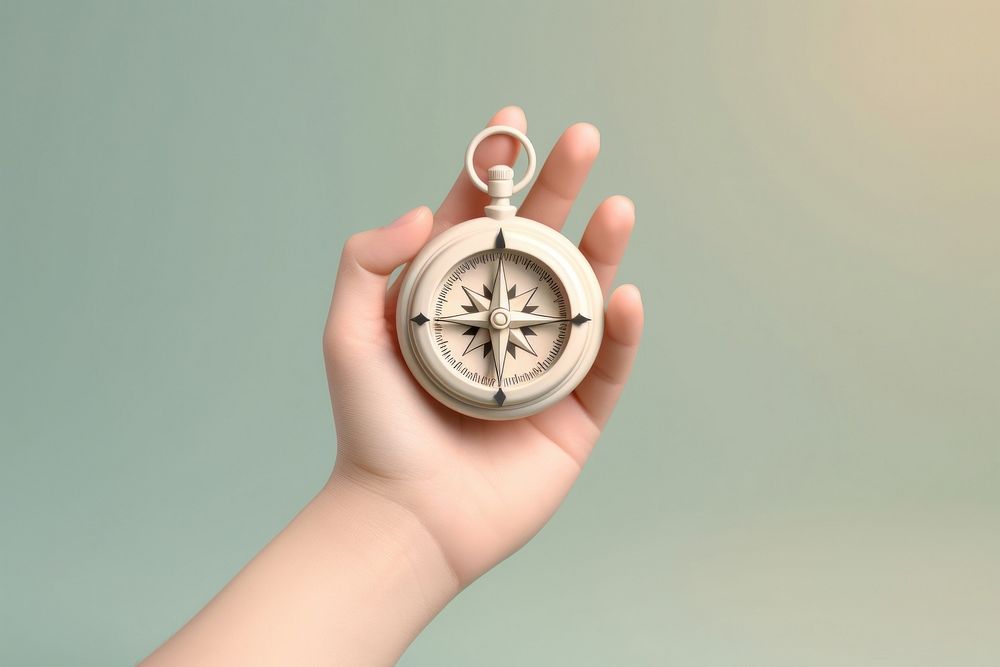Compass holding shape hand. AI generated Image by rawpixel.