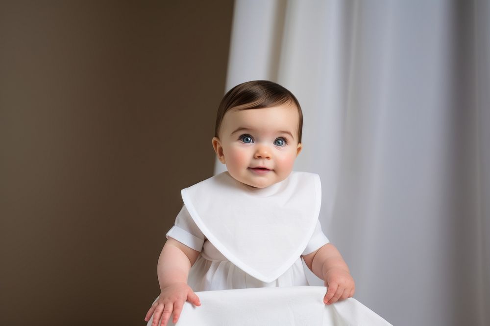 Baby wearing white cotton bib portrait photo photography. AI generated Image by rawpixel.