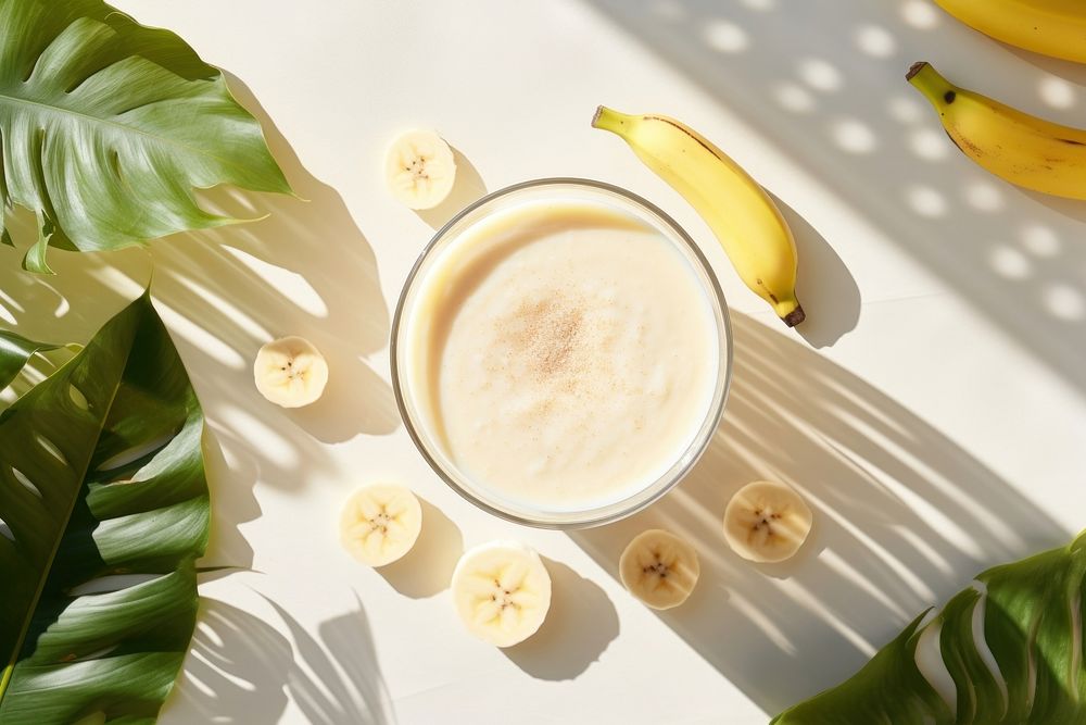 Banana smoothie coffee fruit drink. AI generated Image by rawpixel.