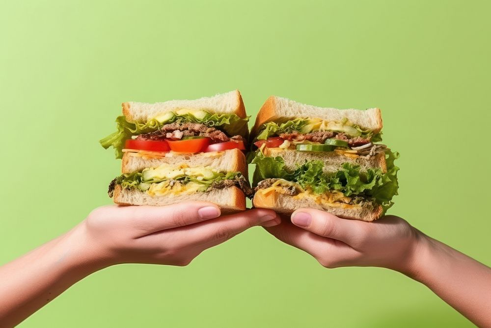 Sandwiches holding adult food. AI generated Image by rawpixel.