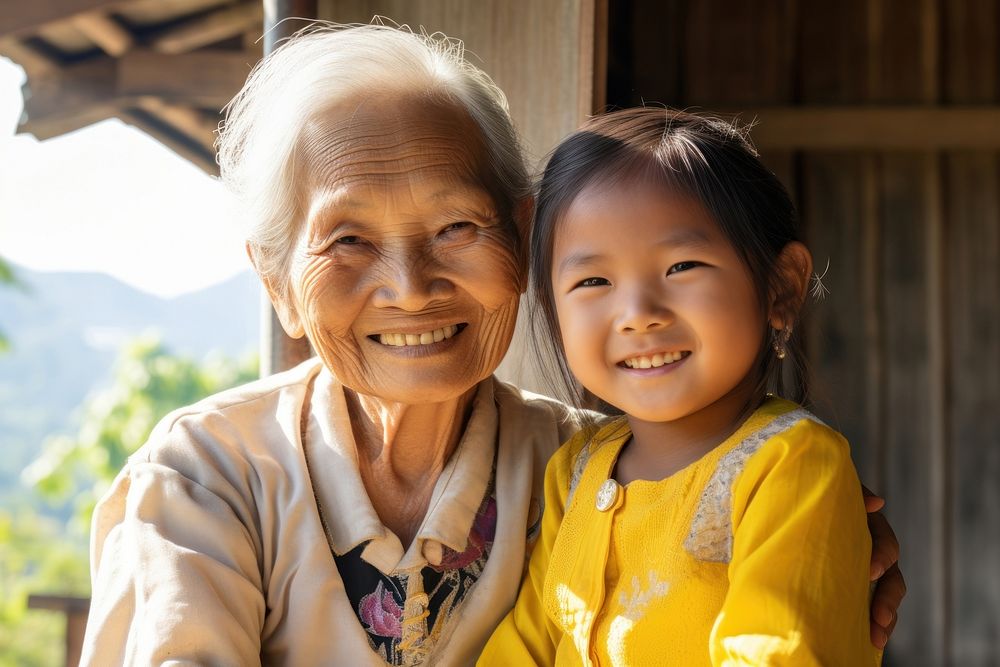 South east asian grandmother smiling adult. AI generated Image by rawpixel.