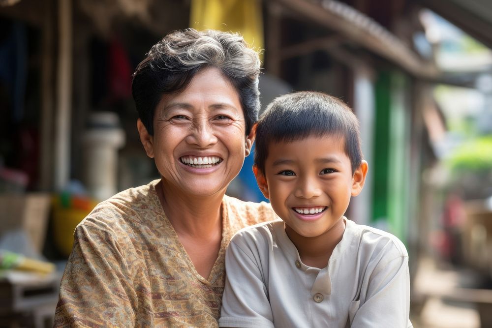 South east asian smiling family adult. AI generated Image by rawpixel.