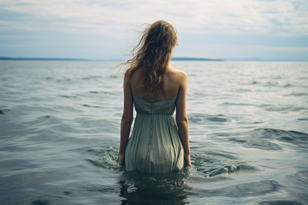 Woman ocean standing outdoors. AI generated Image by rawpixel.