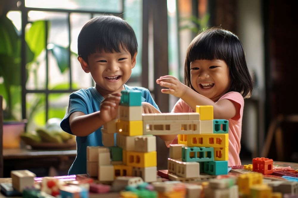 South east asia Children Playing With colorful Toy Blocks child toy togetherness. AI generated Image by rawpixel.