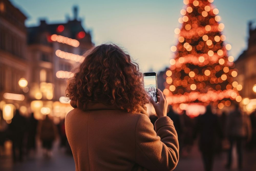 Black woman taking photo christmas adult phone. AI generated Image by rawpixel.