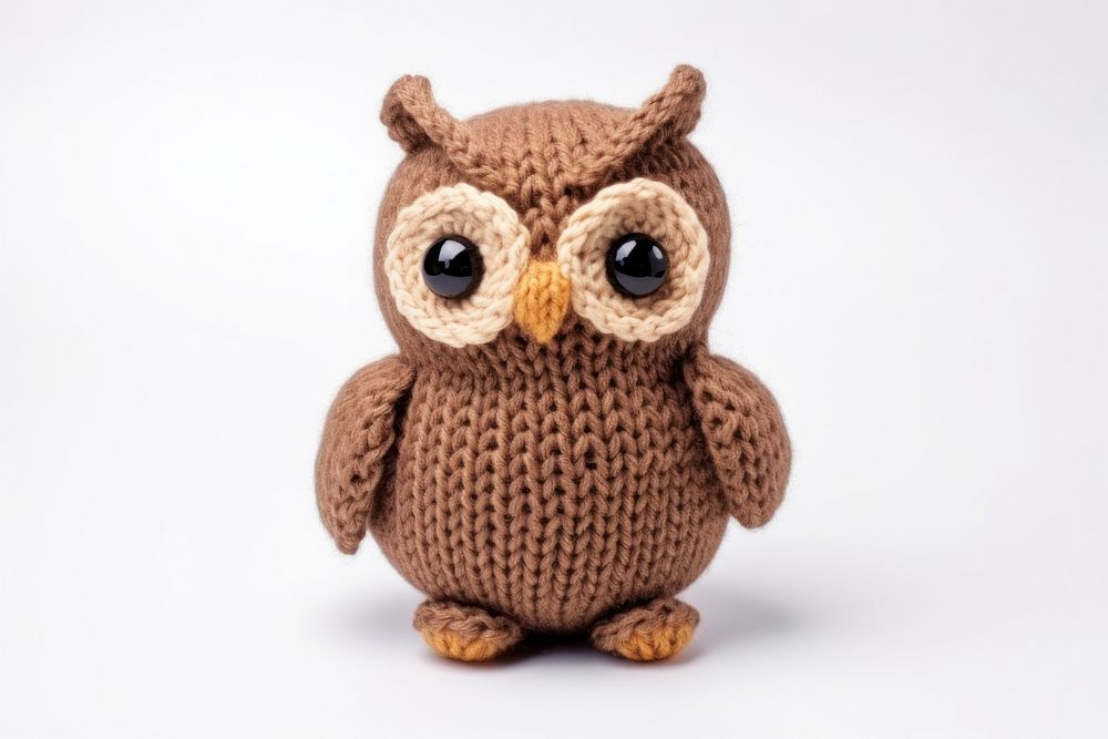 Knitted cute toy owl white background representation. AI generated Image by rawpixel.