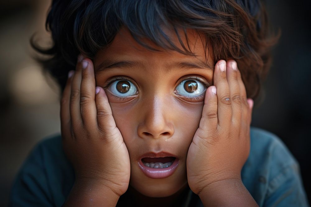 Surprised indian child hand portrait photo. AI generated Image by rawpixel.
