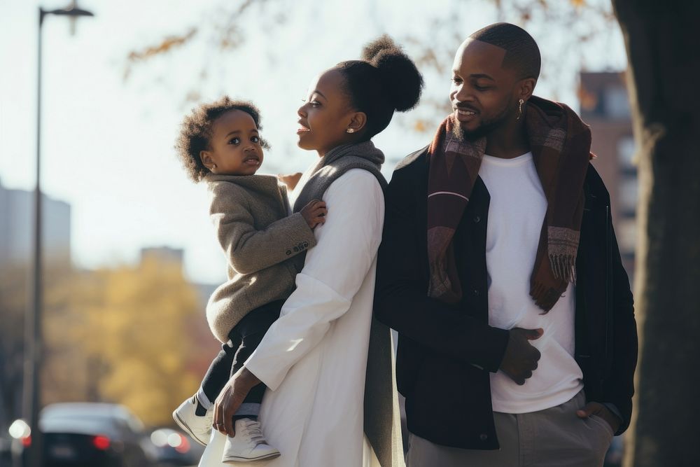 African American family outdoors adult city. AI generated Image by rawpixel.