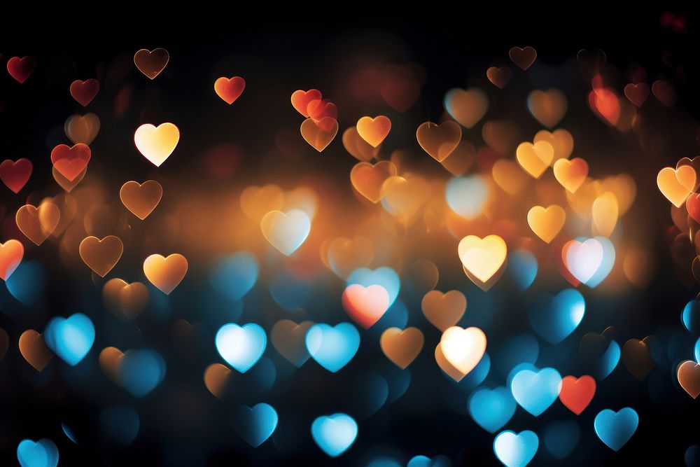 Bokeh hearts background backgrounds night black background. AI generated Image by rawpixel.