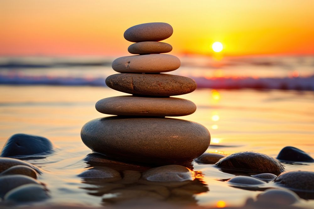 Balance pebble sunset stone. AI generated Image by rawpixel.