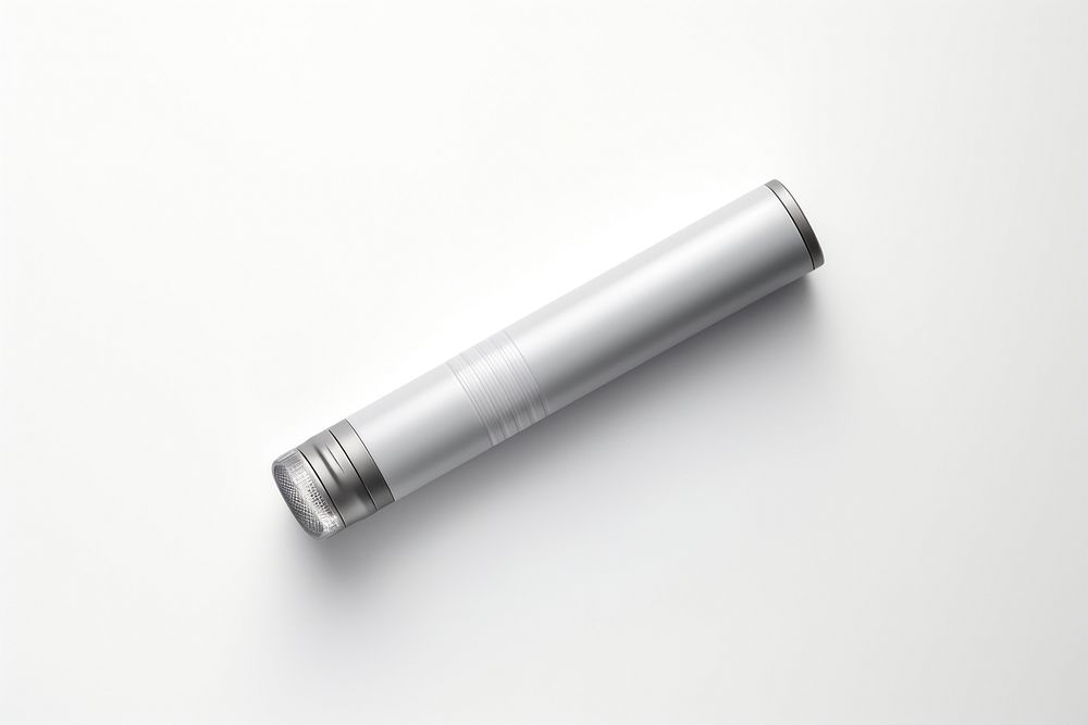 A torch white background flashlight cylinder. AI generated Image by rawpixel.