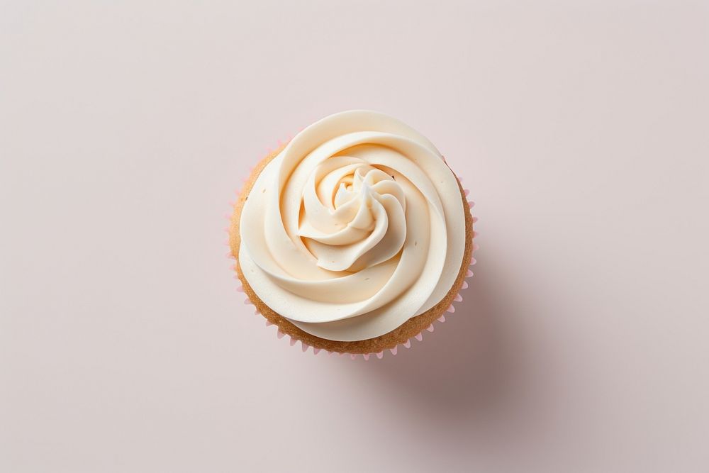 A beautiful vanilla cupcake dessert icing cream. AI generated Image by rawpixel.
